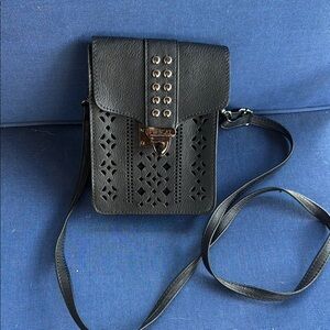 Edgy Black Crossbody Bag with Geometric Studs